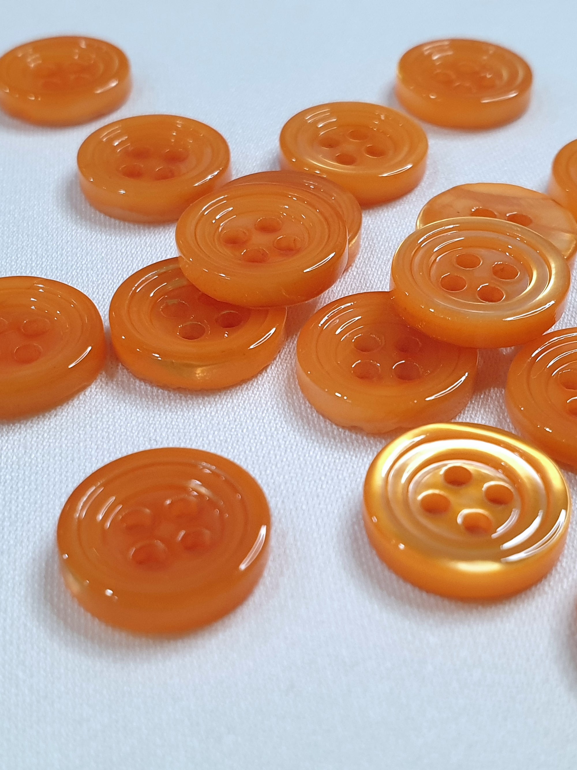 SP02/OR HUBERROSS Apricot Colored Trocus Shell Buttons