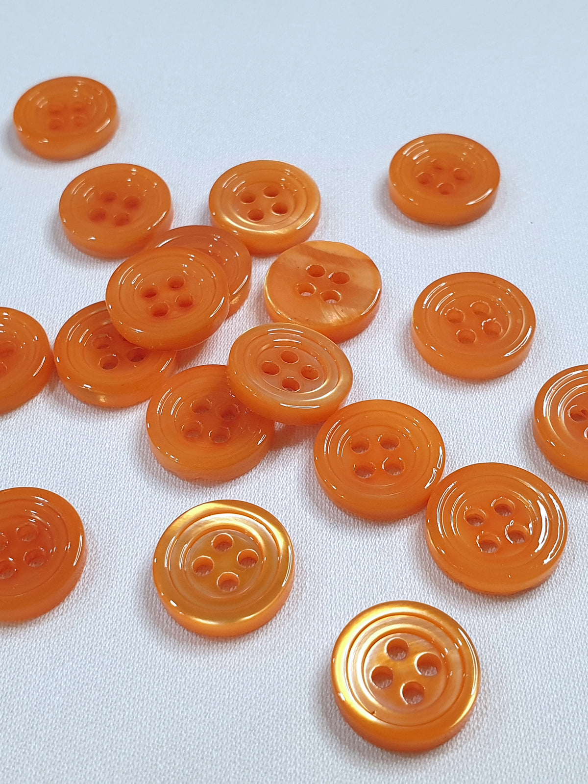 SP02/OR HUBERROSS Apricot Colored Trocus Shell Buttons