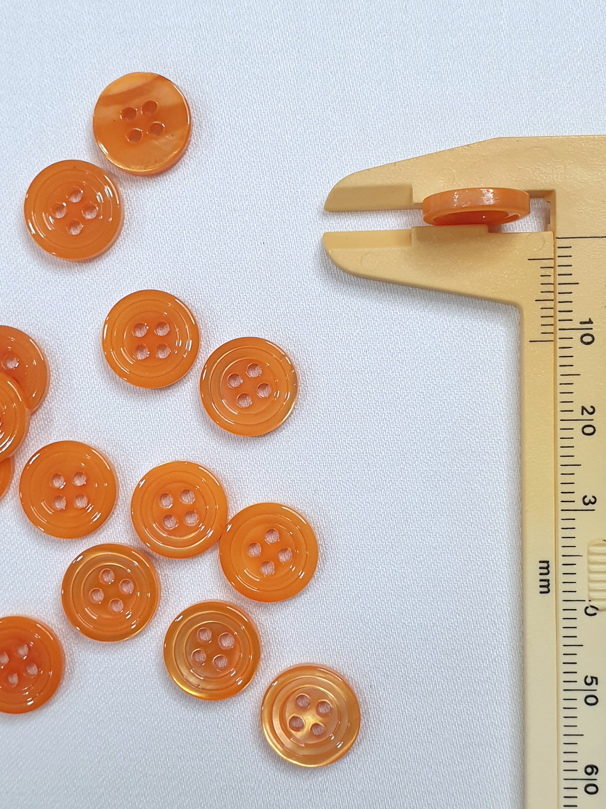SP02/OR HUBERROSS Apricot Colored Trocus Shell Buttons