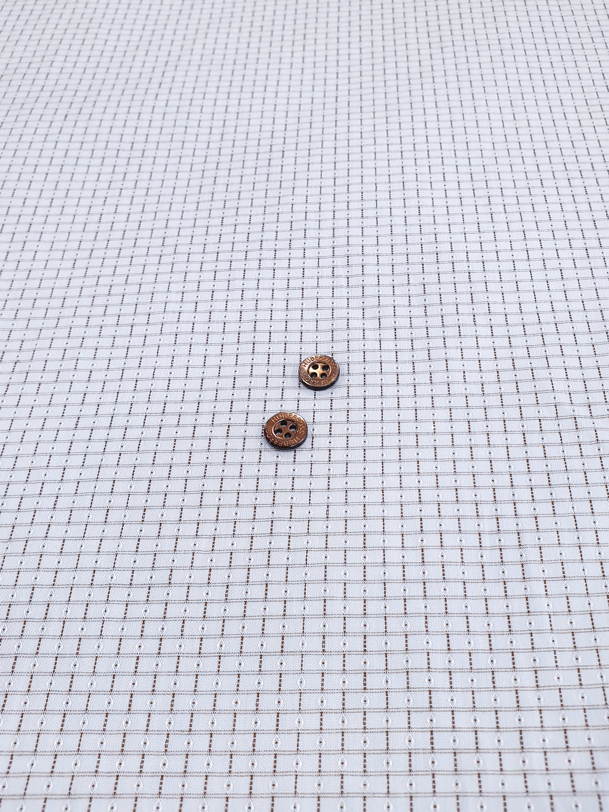 702.203