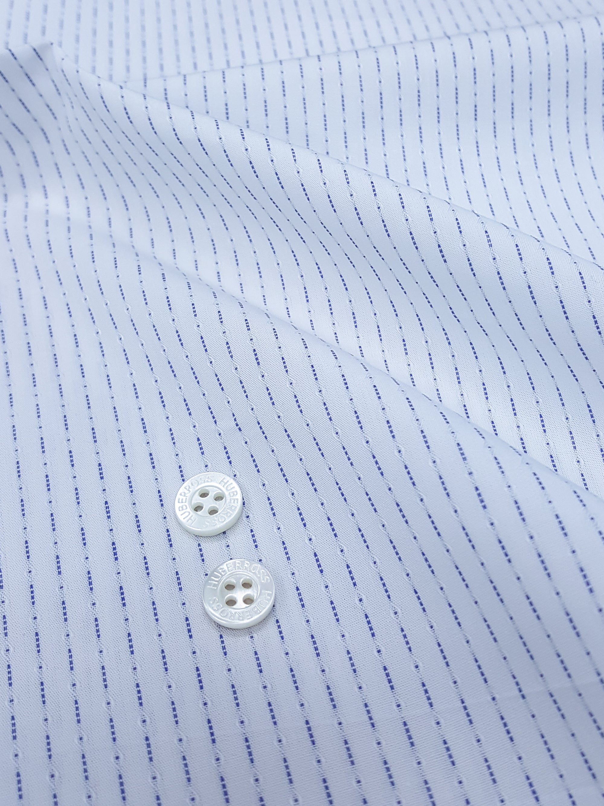 702.211